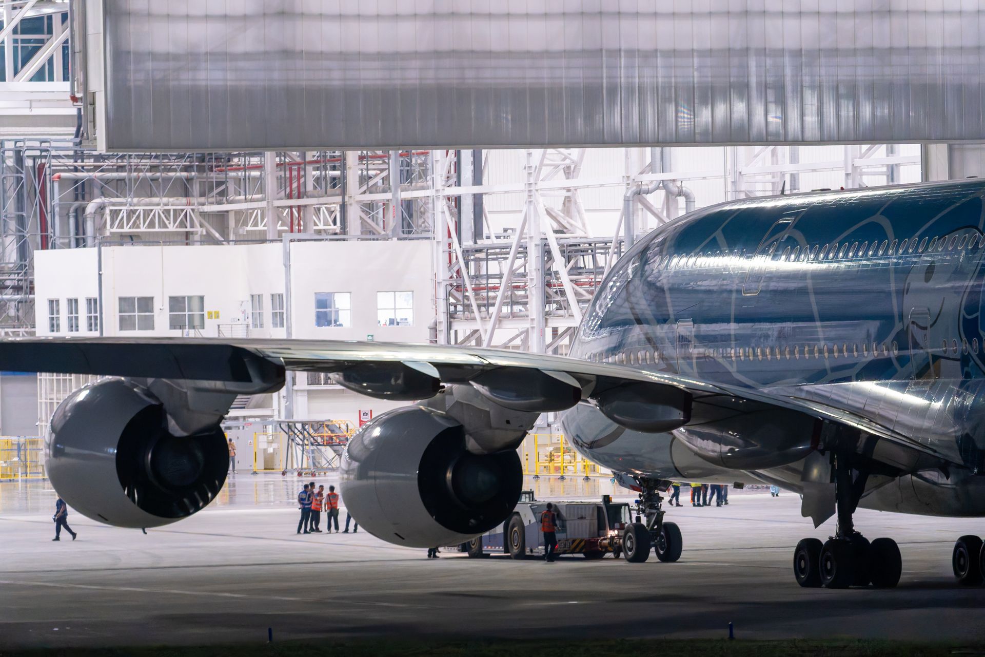 Commercial aircraft inside a maintenance hangar